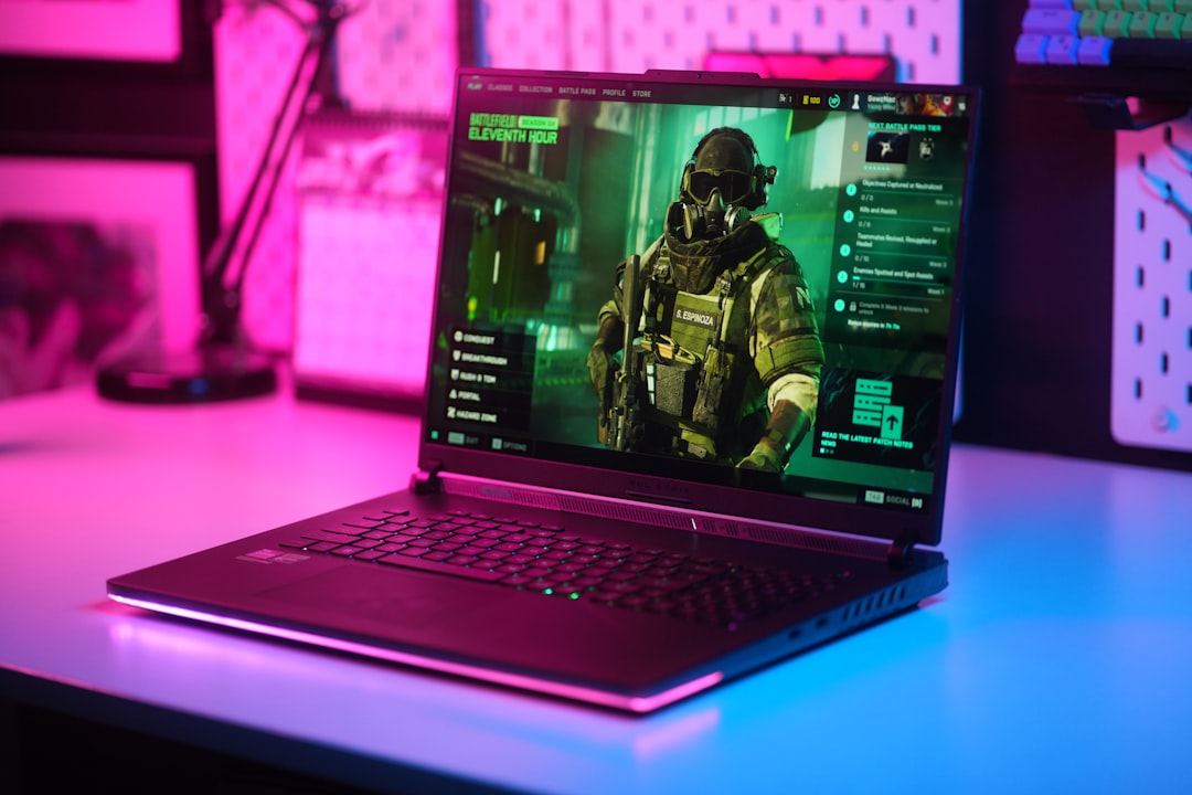 ASUS ROG gaming laptop on desk with RGB lighting — best thin and light gaming laptops 2026