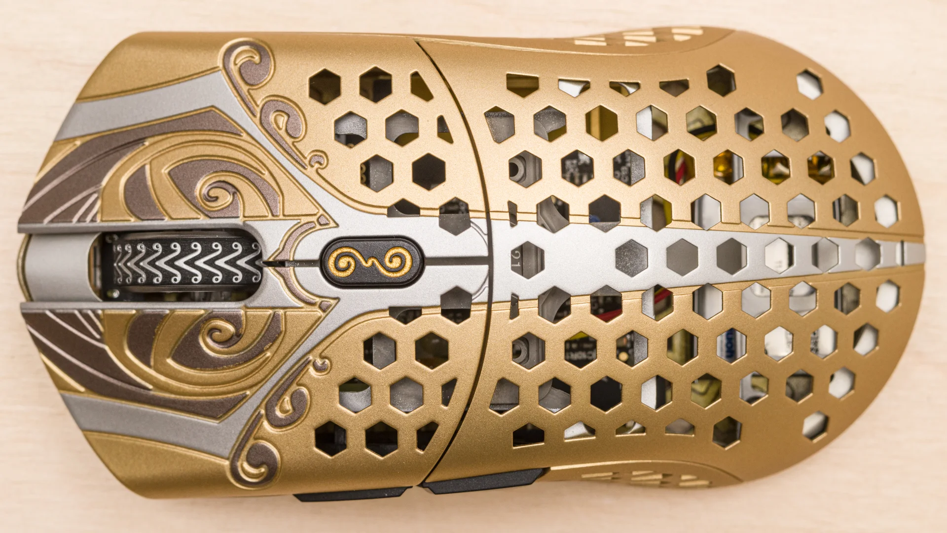 Close-up of a competitive gamer's hand gripping a lightweight wireless gaming mouse.