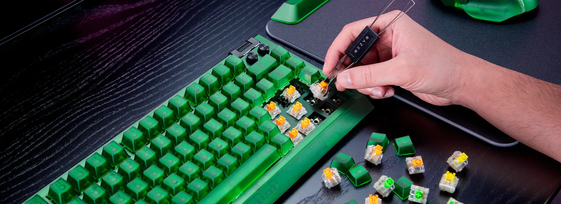 A gaming keyboard with a brushed aluminum top plate, showcasing its sturdy construction.
