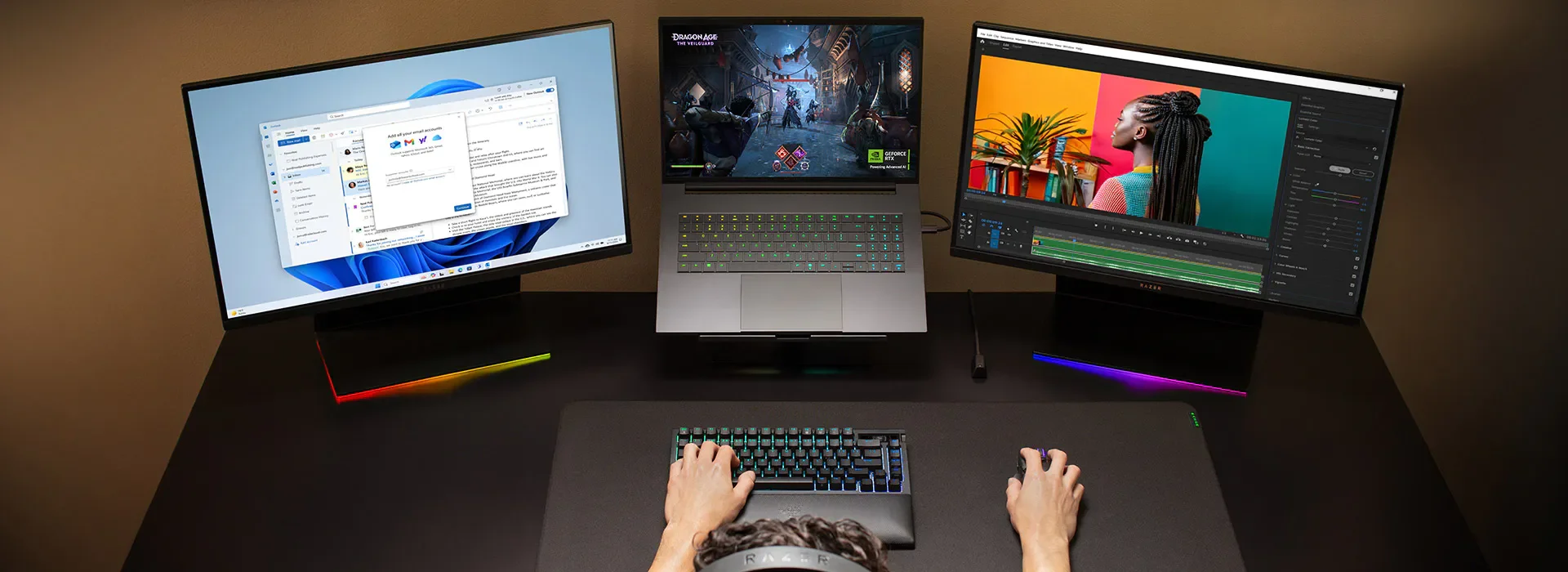 Razer Blade 14 in a low light setting with RGB lighting active.