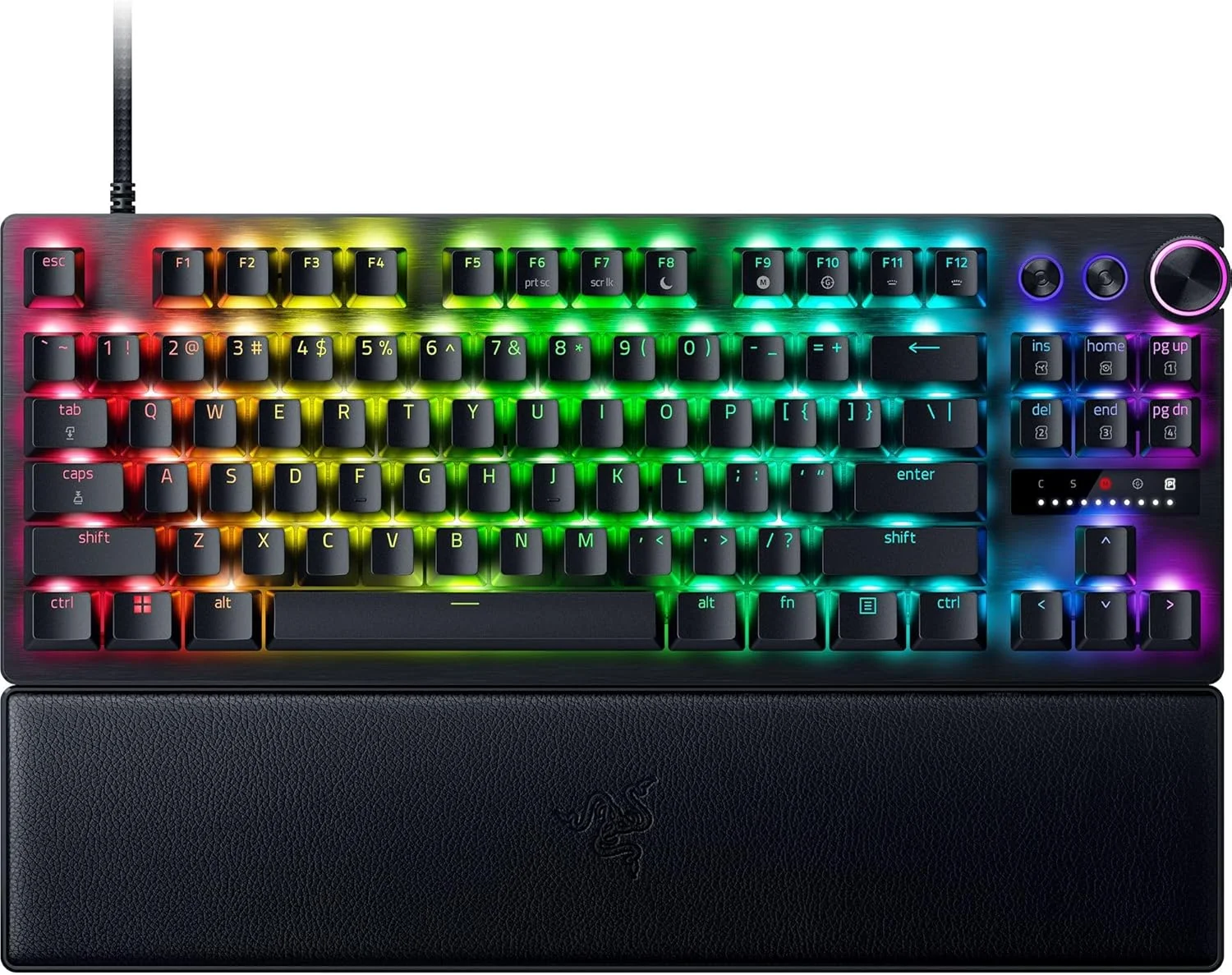 The Razer Huntsman V3 Pro TKL keyboard on a desk, showing its customizable RGB lighting profiles active.