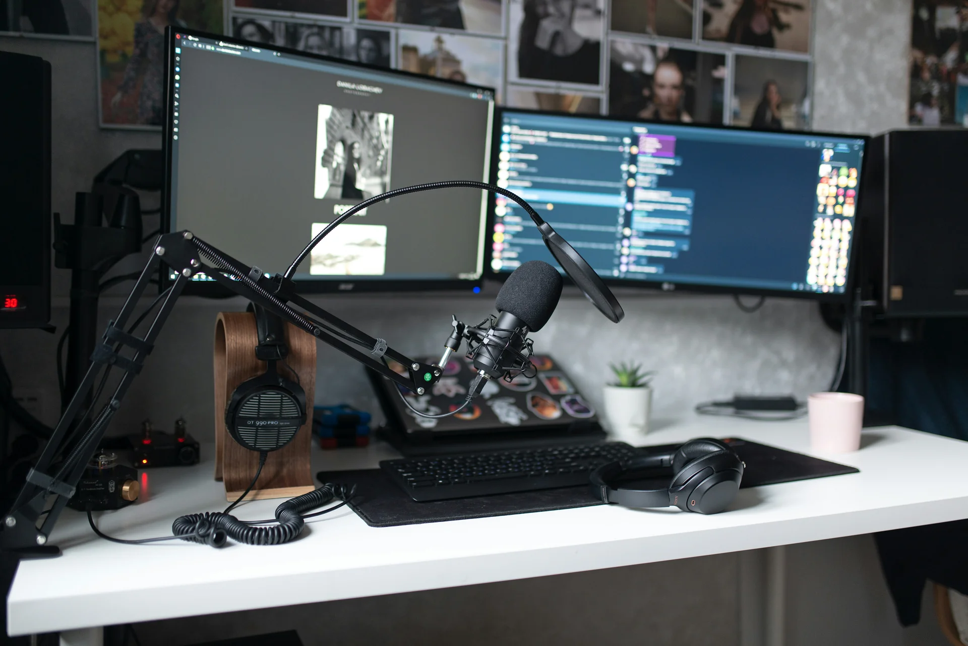 HyperX SoloCast desktop microphone mounted on a studio boom arm