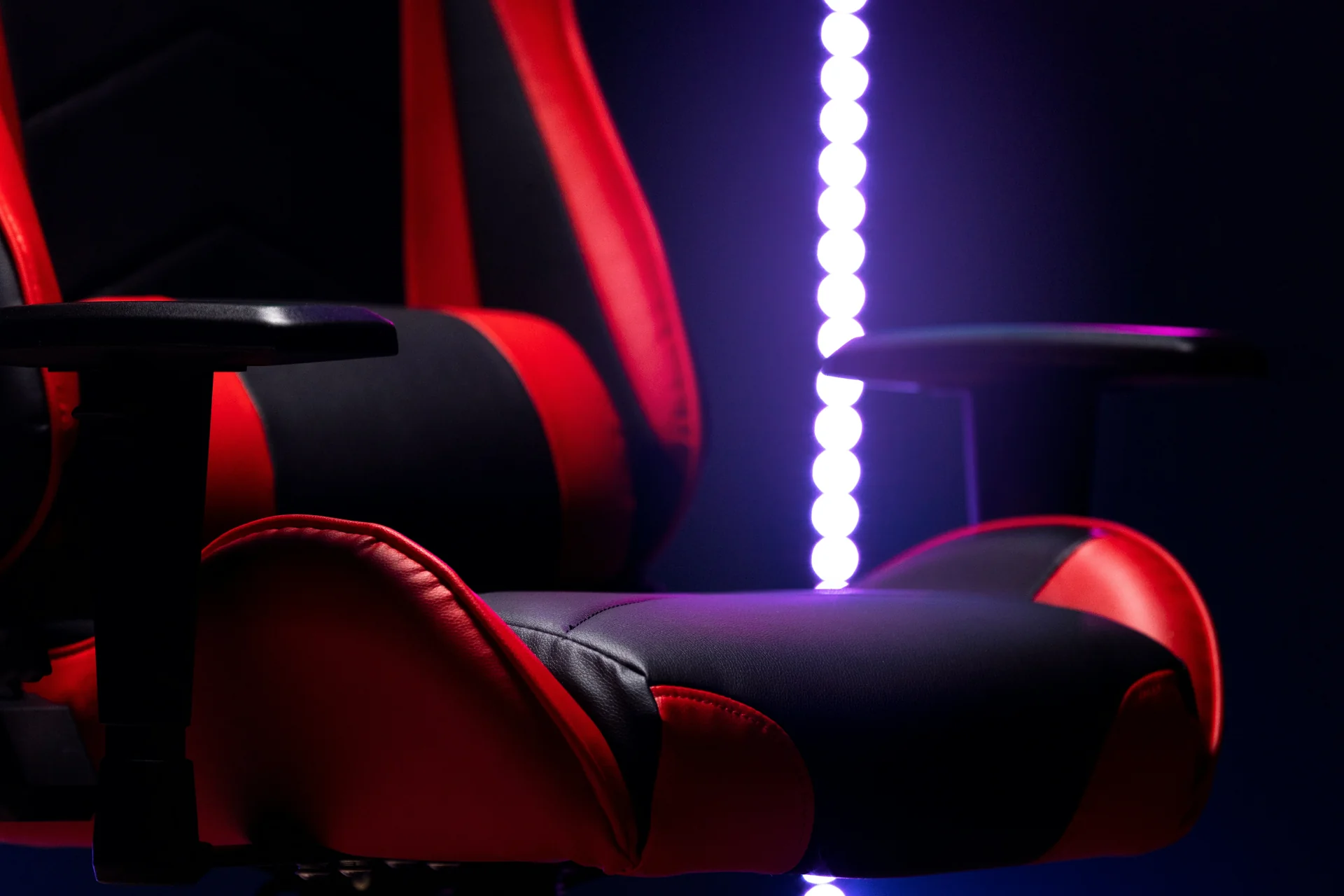 A side profile view of the Secretlab Titan Evo SoftWeave Plus showing the fabric texture.